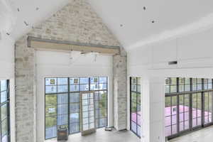 Entryway with high vaulted ceiling