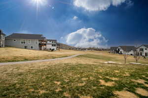 View of yard with a residential view