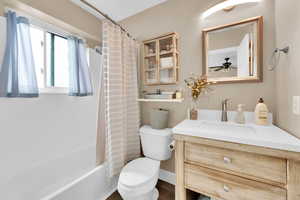 Master bathroom with vanity and shower / tub combo