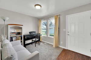 Office/living area with wood finished floors