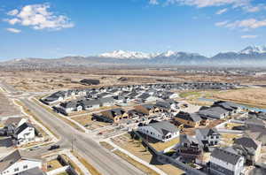 Drone / aerial view with a residential view and a mountain view