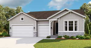 View of front facade featuring a front yard, an attached garage, stone siding, and concrete driveway