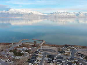 Aerial view featuring a water and mountain view