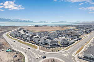 Drone / aerial view featuring a mountain view and a residential view