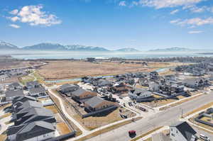 Drone / aerial view featuring a mountain view and a residential view