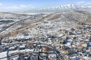 Birds eye view of property featuring a mountain view and a residential view