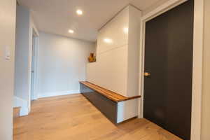 mud room at the bottom of the stairs