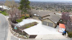 Birds eye view of property. RV parking where storage unit is.