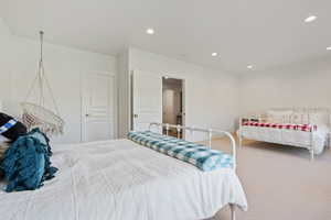 Bedroom featuring carpet flooring and recessed lighting