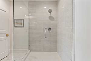 Bathroom with a tile shower