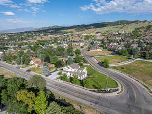 Drone / aerial view featuring a residential view and a mountain view