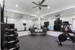 Exercise room with visible vents, recessed lighting, and a ceiling fan
