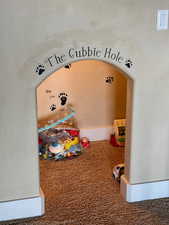 Cubby under stairs