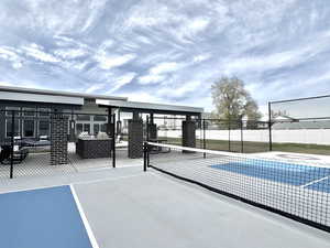 View of patio / terrace featuring fence and a fenced in pool