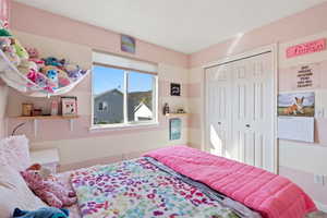 Bedroom featuring a closet