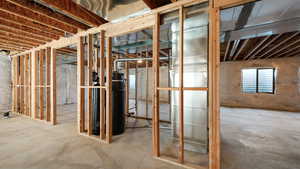 Basement featuring water heater