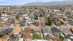 Drone / aerial view featuring a mountain view and a residential view
