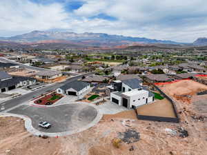 Birds eye view of property featuring a mountain view and a residential view