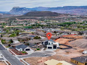 Drone / aerial view featuring a mountain view and a residential view