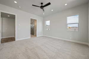 Unfurnished bedroom with baseboards, light colored carpet, and recessed lighting