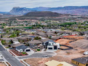 Birds eye view of property featuring a residential view and a mountain view