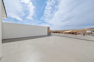 View of patio / terrace with a balcony