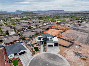 Drone / aerial view with a residential view and a mountain view