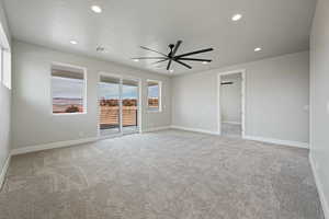 Empty room featuring baseboards, visible vents, recessed lighting, and a ceiling fan