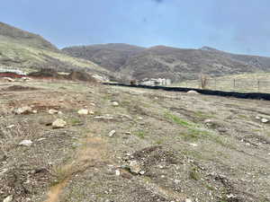 Property view of mountains featuring a rural view