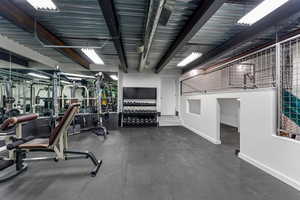 Gym featuring baseboards