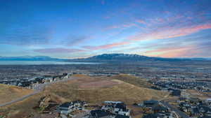 Birds eye view of property featuring a residential view and a mountain view