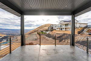 View of patio / terrace with a balcony and a mountain view