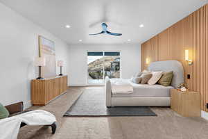 Bedroom with recessed lighting, wooden walls, ceiling fan, and carpet flooring