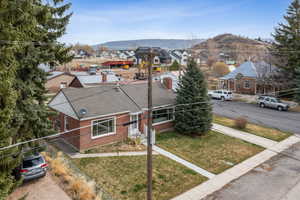 Drone / aerial view featuring a residential view and a mountain view