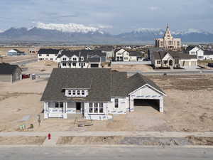 Aerial view featuring a residential view and a mountain view
