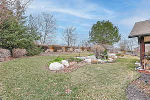 View of yard with fence