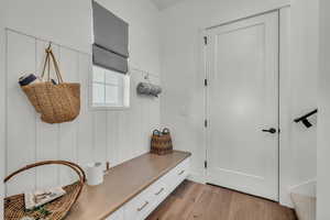 Mudroom featuring light wood-type flooring