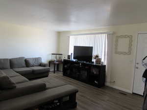 Living room with laminate floors.