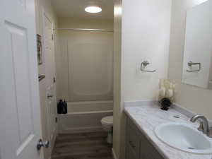 Full bath with vanity, toilet, shower / tub combination. Entrance from master bedroom and hall.