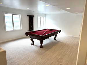 Playroom with baseboards, pool table, crown molding, and plenty of natural light