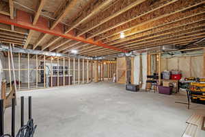 Unfinished basement with stairs