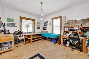 Office area featuring tile patterned floors