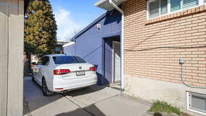 View of side of property with brick siding
