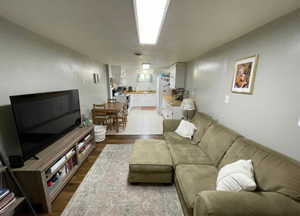 Living area featuring wood finished floors