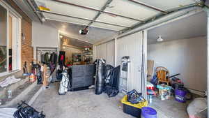 Garage featuring a garage door opener