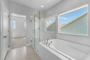 Primary bath with separate bath and shower