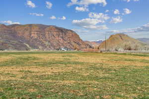 View of mountain feature with a rural view