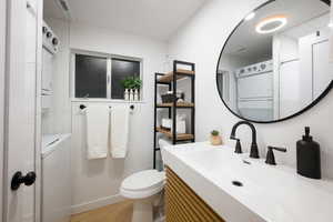 Bathroom with vanity and toilet