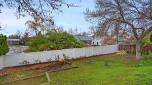 View of fenced backyard