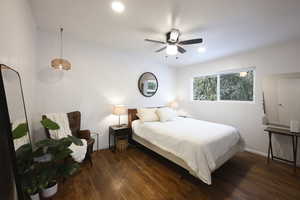 Bedroom with dark wood-style flooring, ceiling fan, and recessed lighting